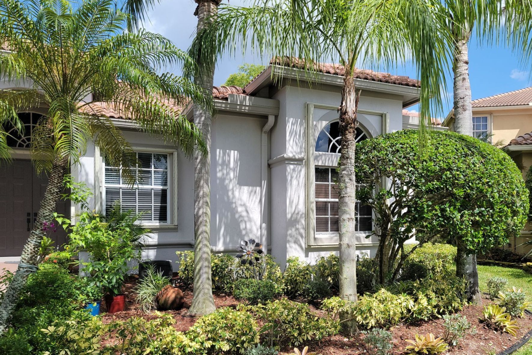 Exterior of Florida home with tropical garden