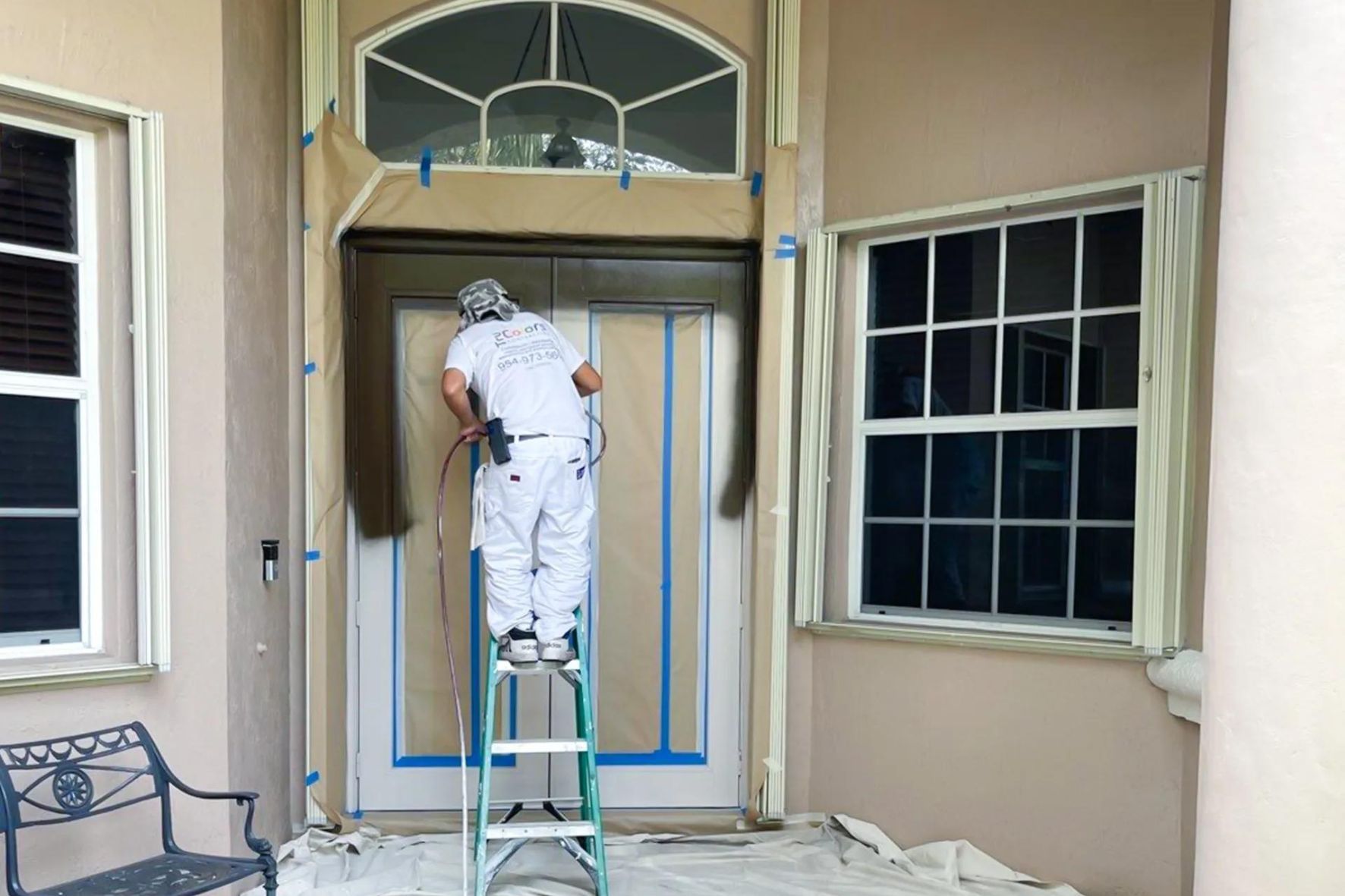 Tru Colors Contracting painting a metal front door