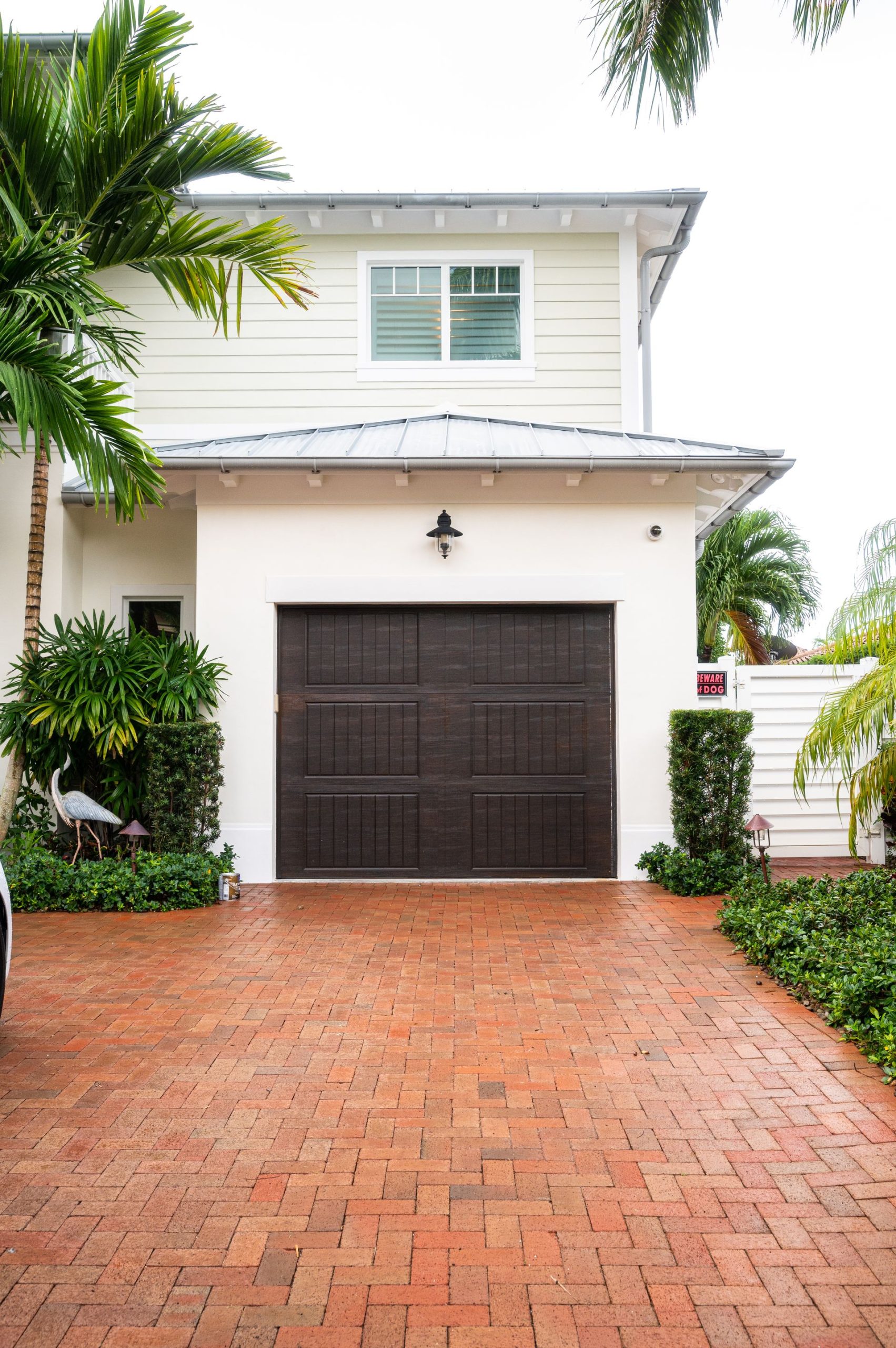 Exterior and garage of newly painted home in south florida