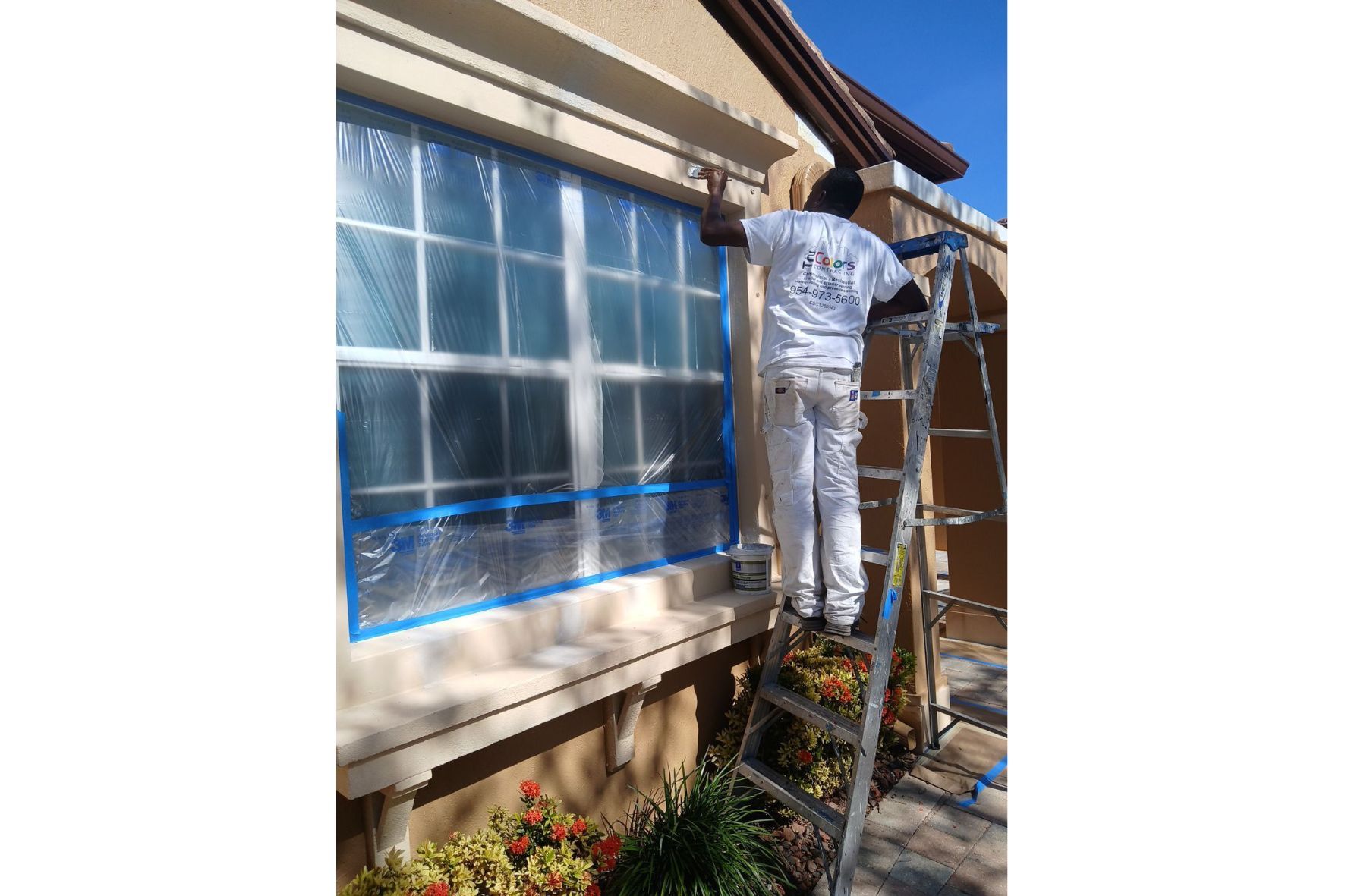 Tru colors contracting team painting the exterior of florida home