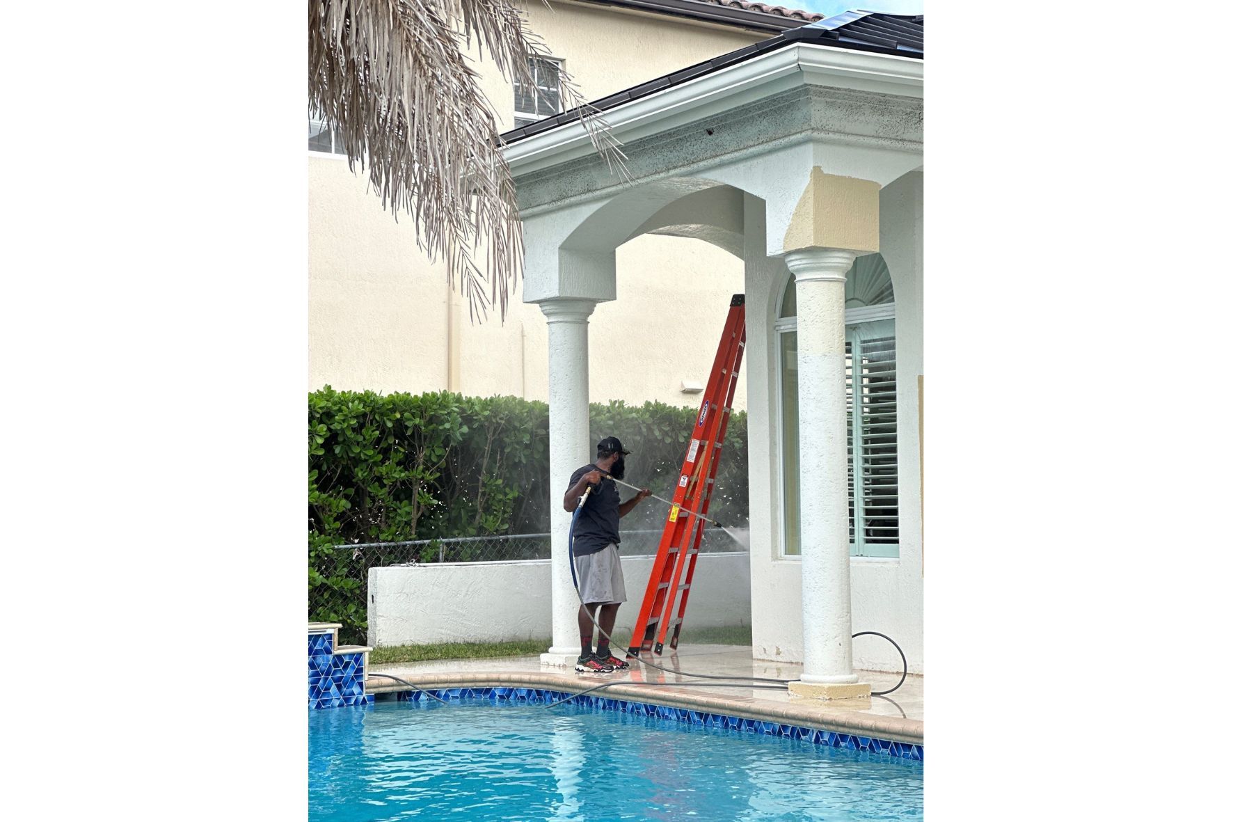 Tru colors contracting pressure washing a home in florida