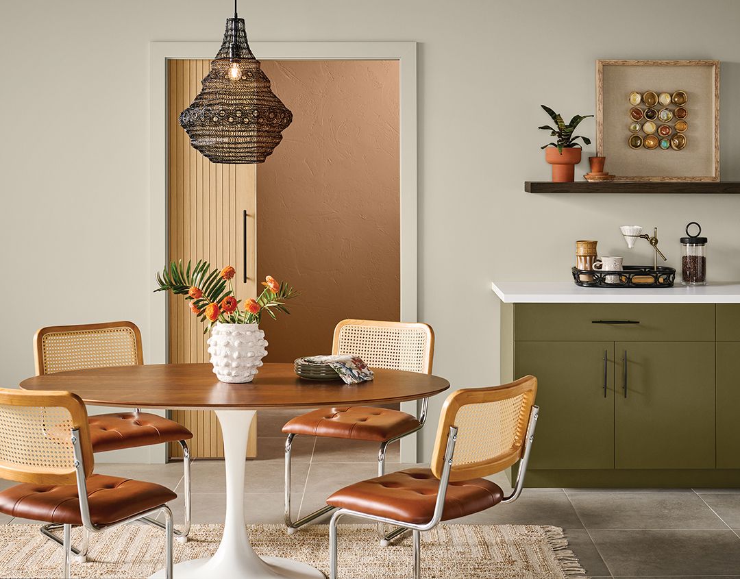 Dining room with cabinets painted sherwin-williams palm leaf