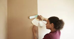 Person color matching wall color